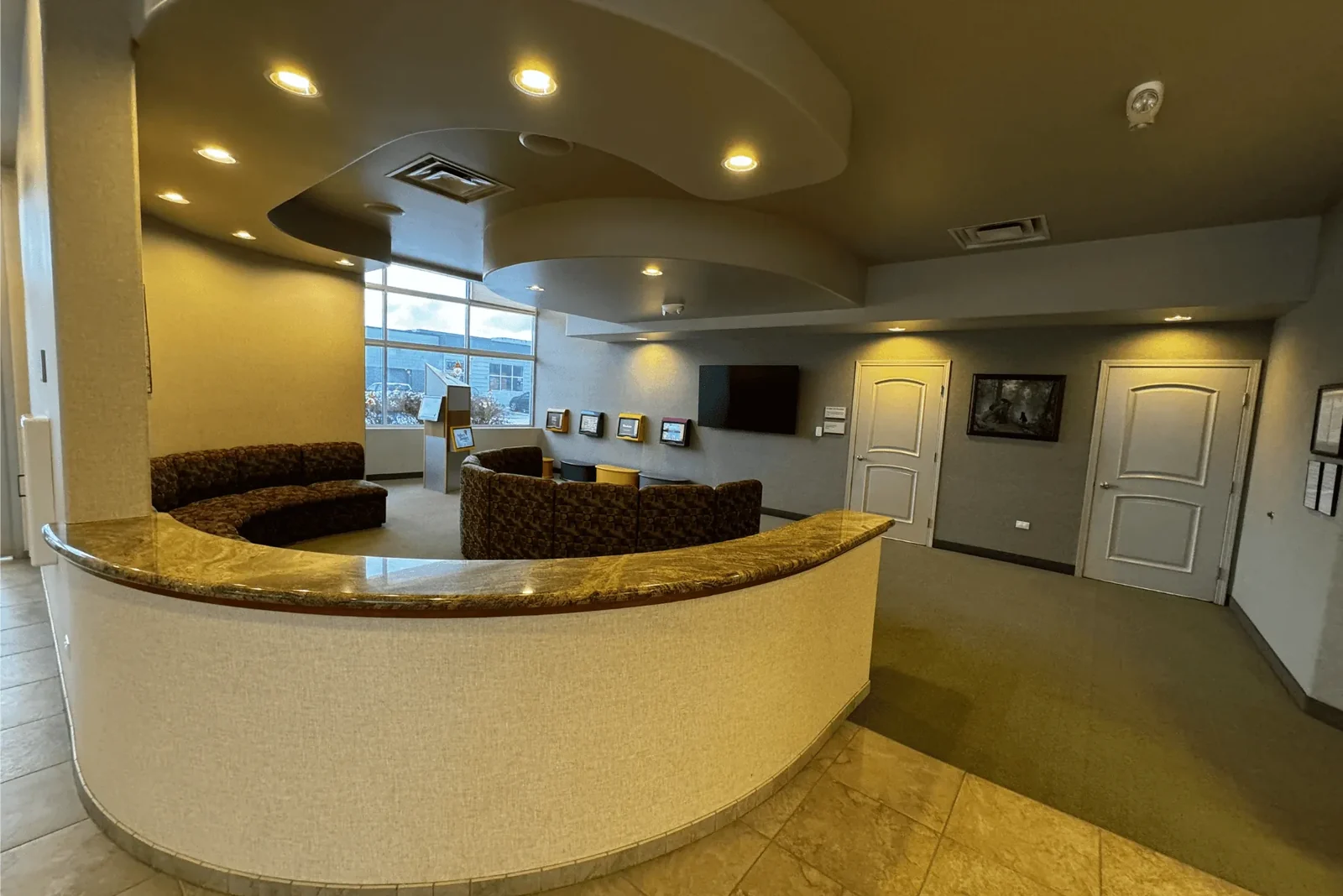 Curved seating area inside Pediatric Dentistry of Alaska.