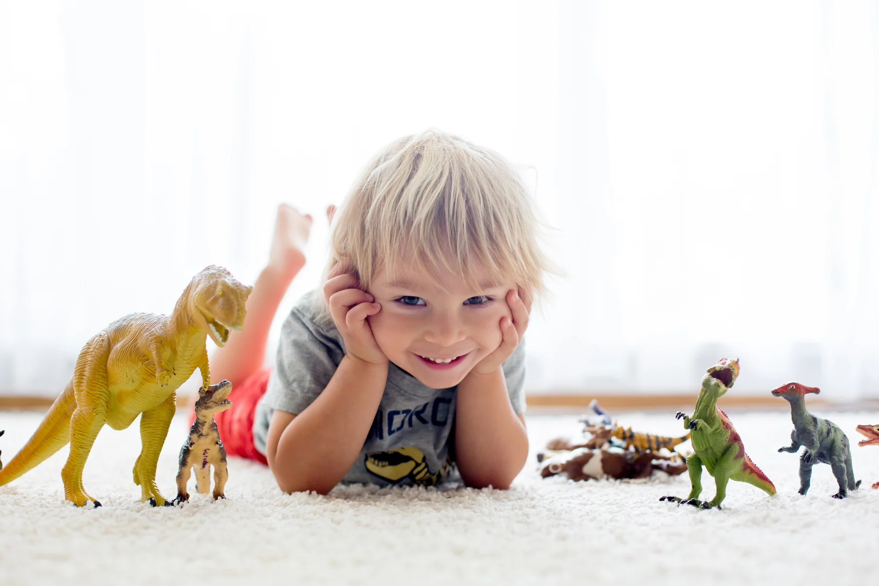 A child playing at home for Oral Cancer Screenings.