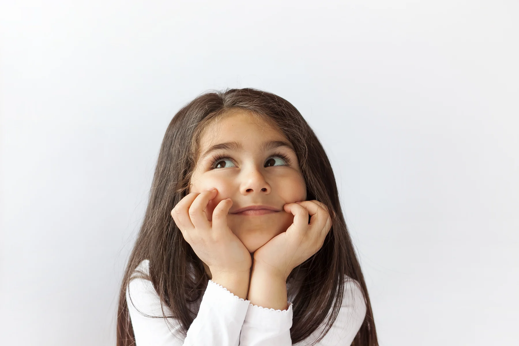 A child making a nervous face for Pediatric Dental Anxiety.